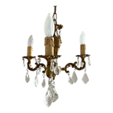 Chandelier with tassels and brass
