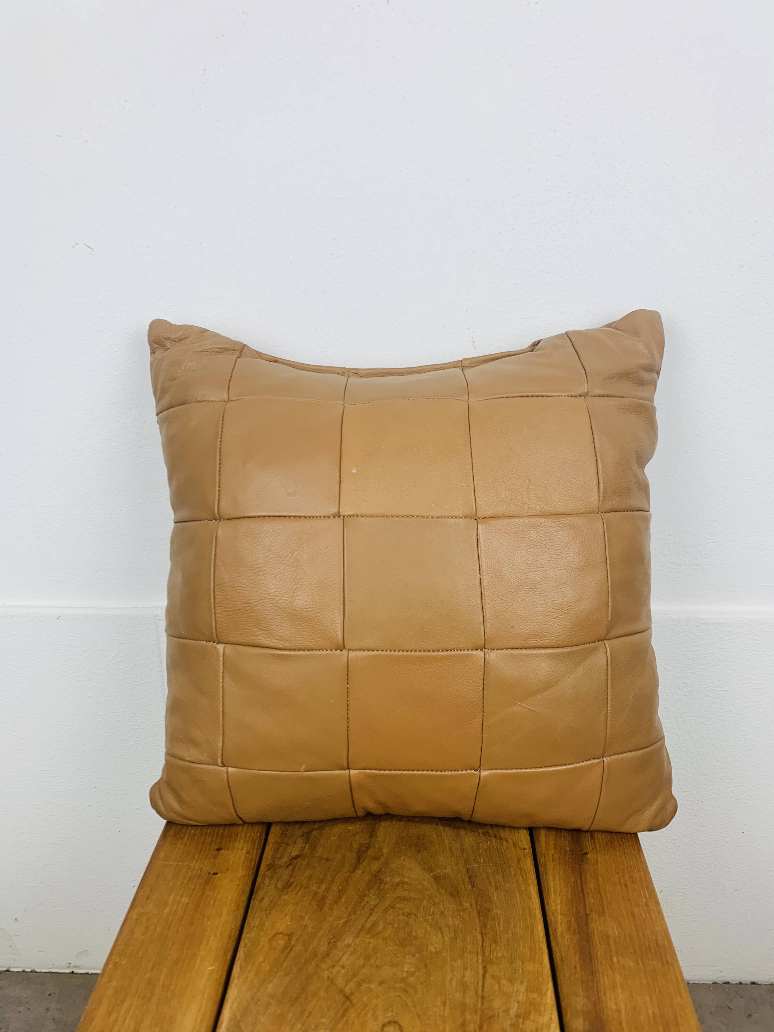 Vintage patchwork leather cushion