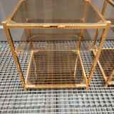 Sofa ends.in gilded metal and glass