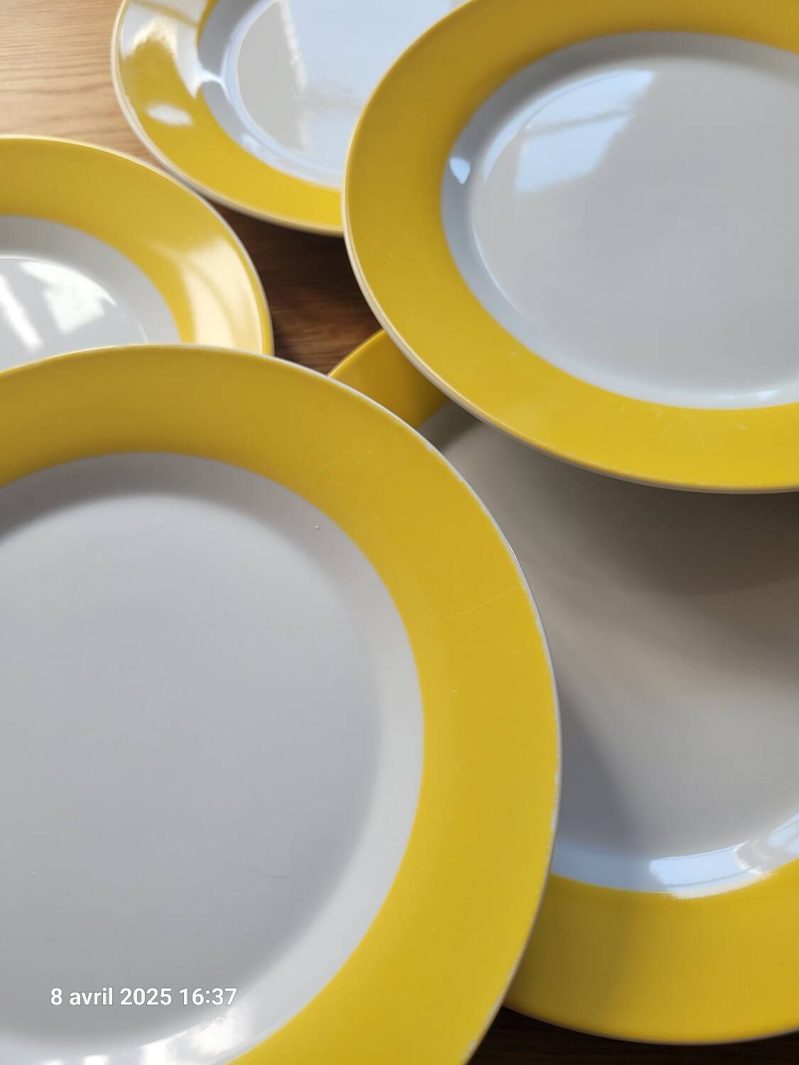 7 yellow and white dessert plates