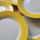 7 yellow and white dessert plates