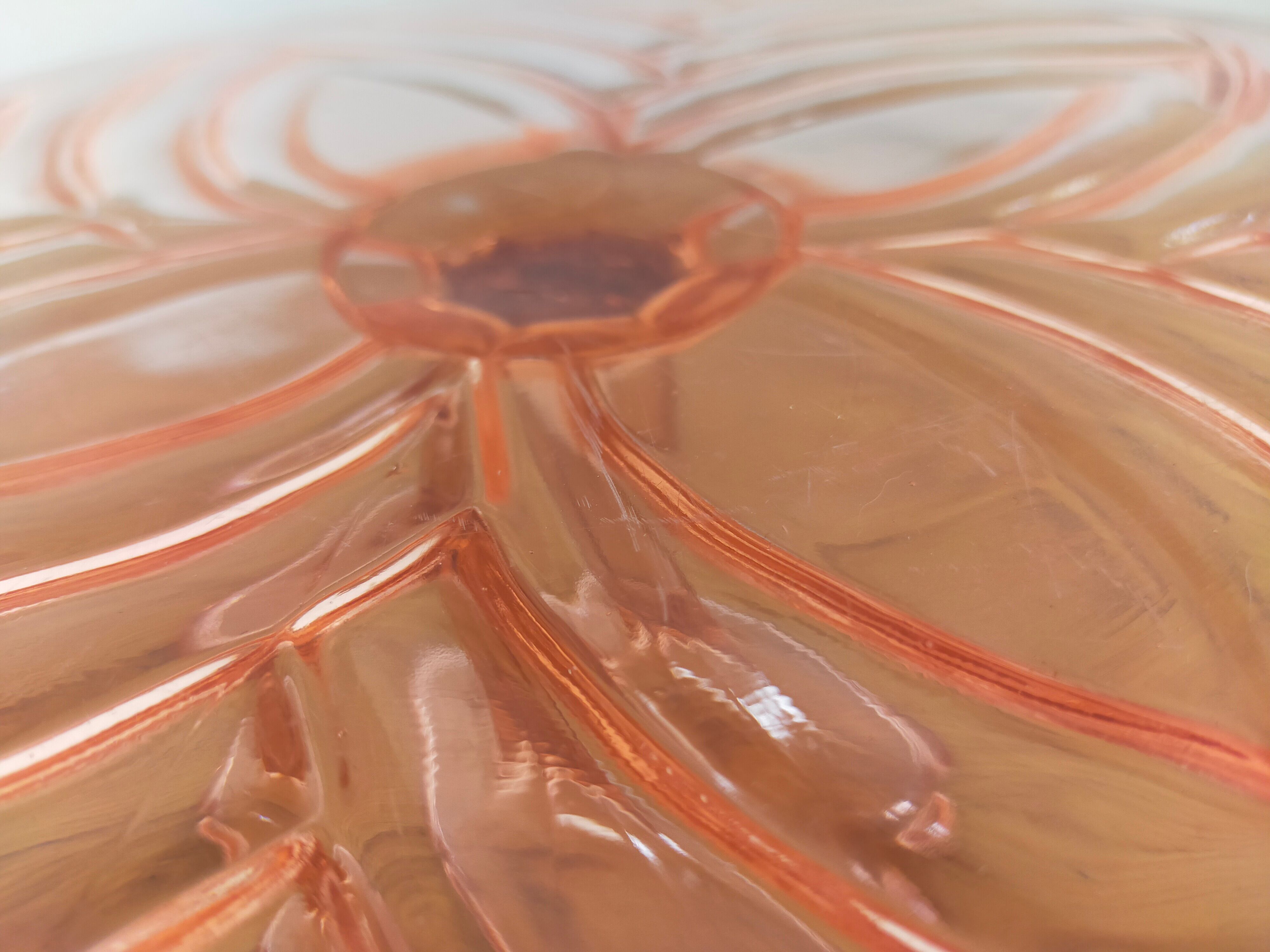 Vintage cake display in pink art deco molded glass