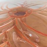 Vintage cake display in pink art deco molded glass