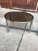 Mid-Century tubular coffee table with grey smoked glass and chrome metal, 1960s design.