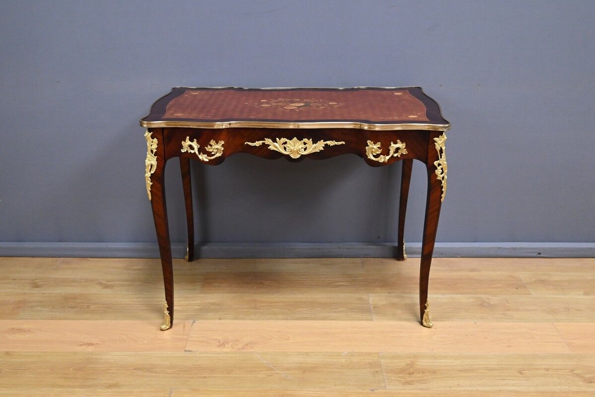 Rosewood, mahogany, and rosewood desk-table, Louis XV style – early 20th century.