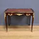 Rosewood, mahogany, and rosewood desk-table, Louis XV style – early 20th century.