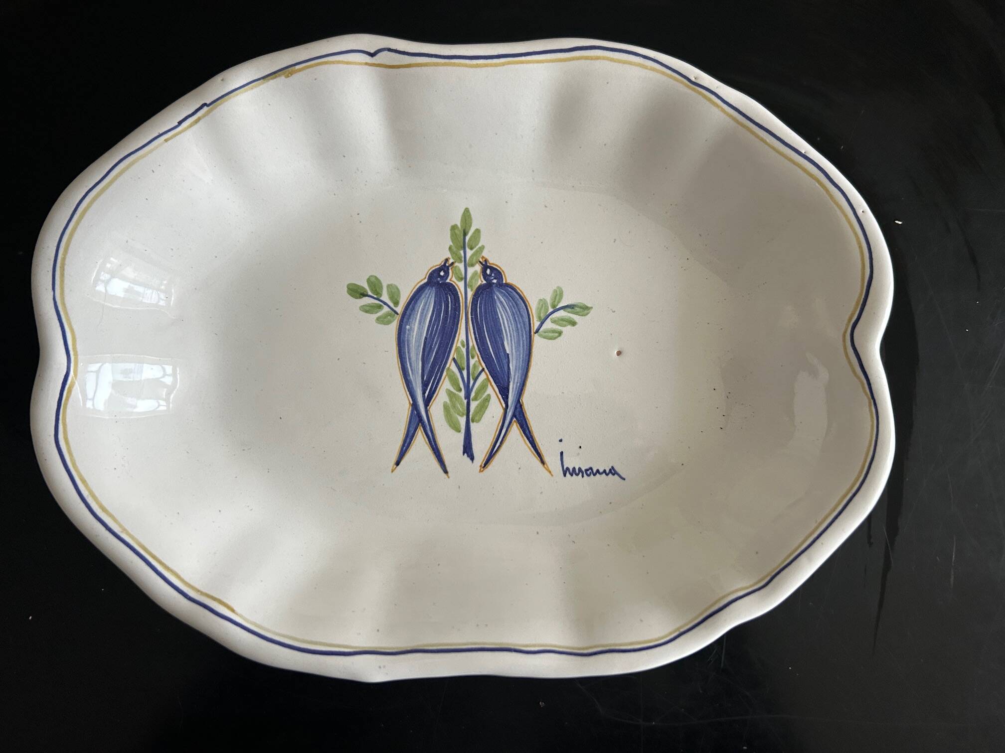 vintage plate in earthenware with birds