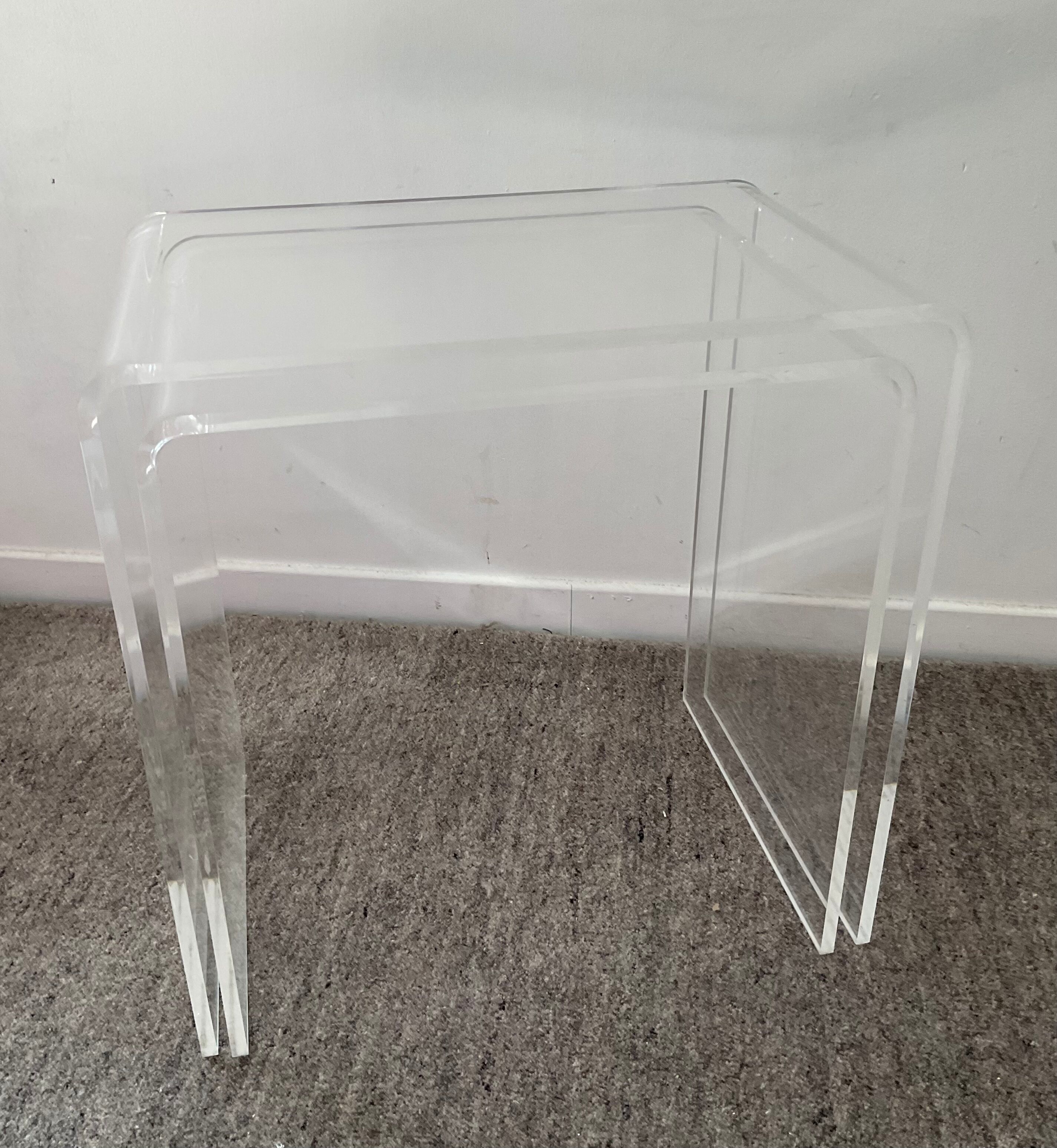 Duo of pull-out tables in plexiglass 70s