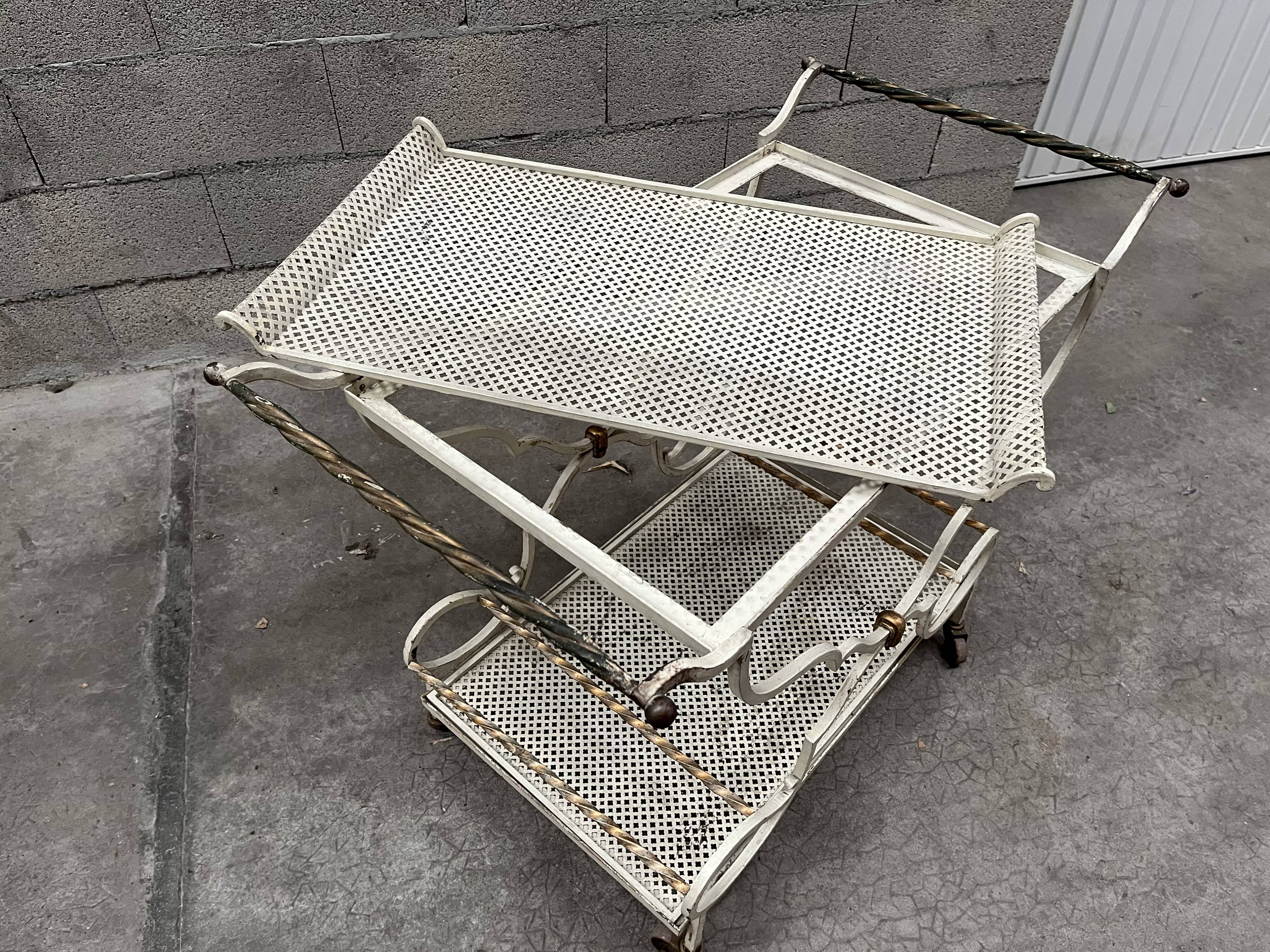 Service in wrought iron of the 60s