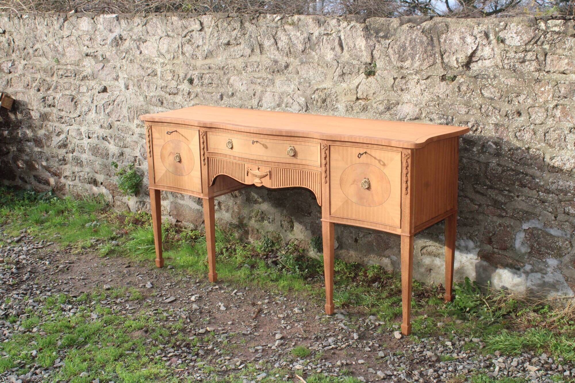 English-made enfilade in Louis XVI style with light wood veneers.