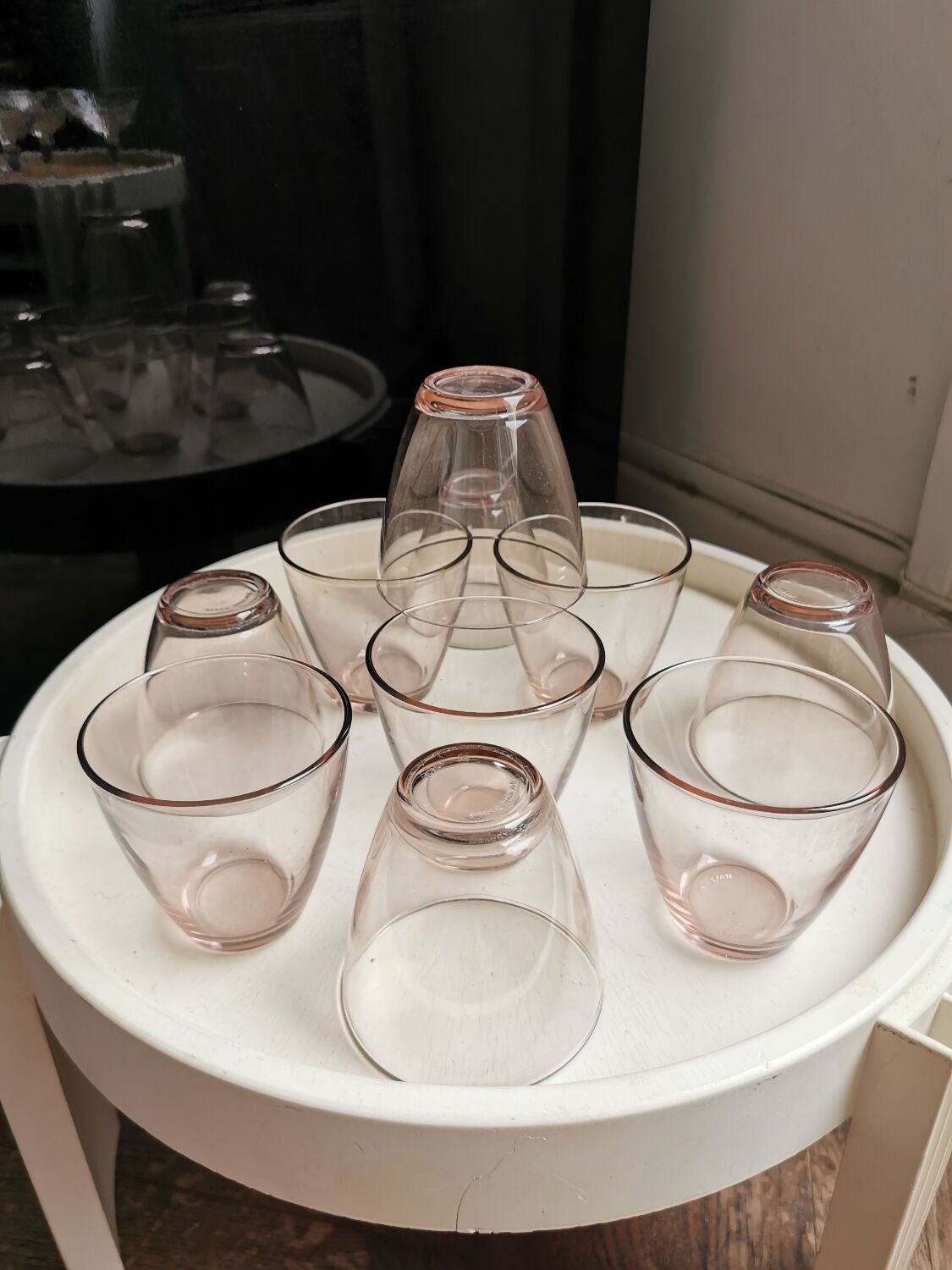 10 glasses of pink amber water