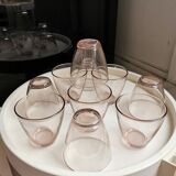 10 glasses of pink amber water