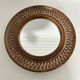 Chiselled stone mirror