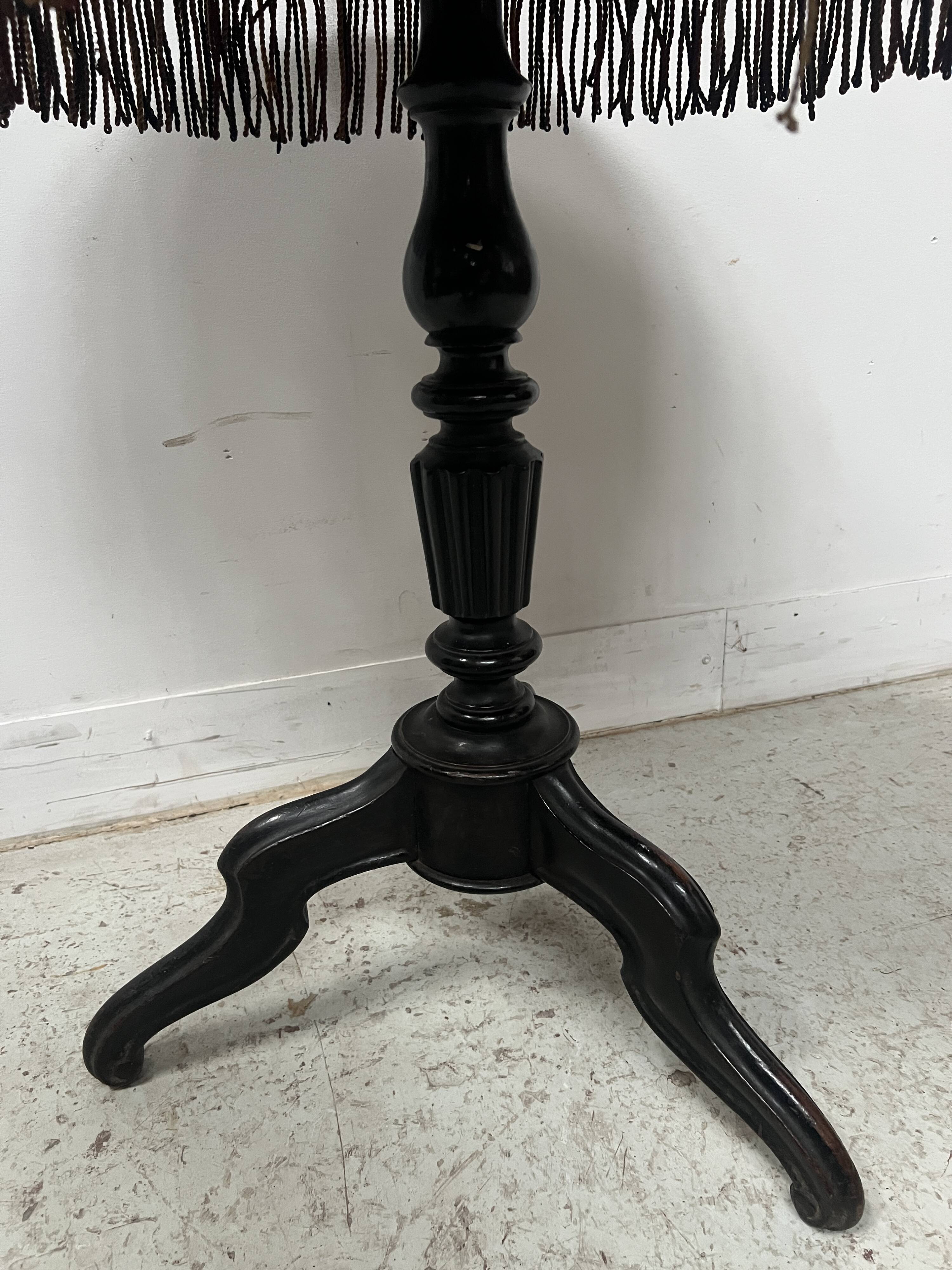 Napoleon III tilting side table in blackened wood, 19th century