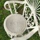Fauteuil rotin peacock années 60