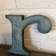 Blue sign letter "R"