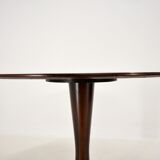 Designed mahogany round dining table, 1969
