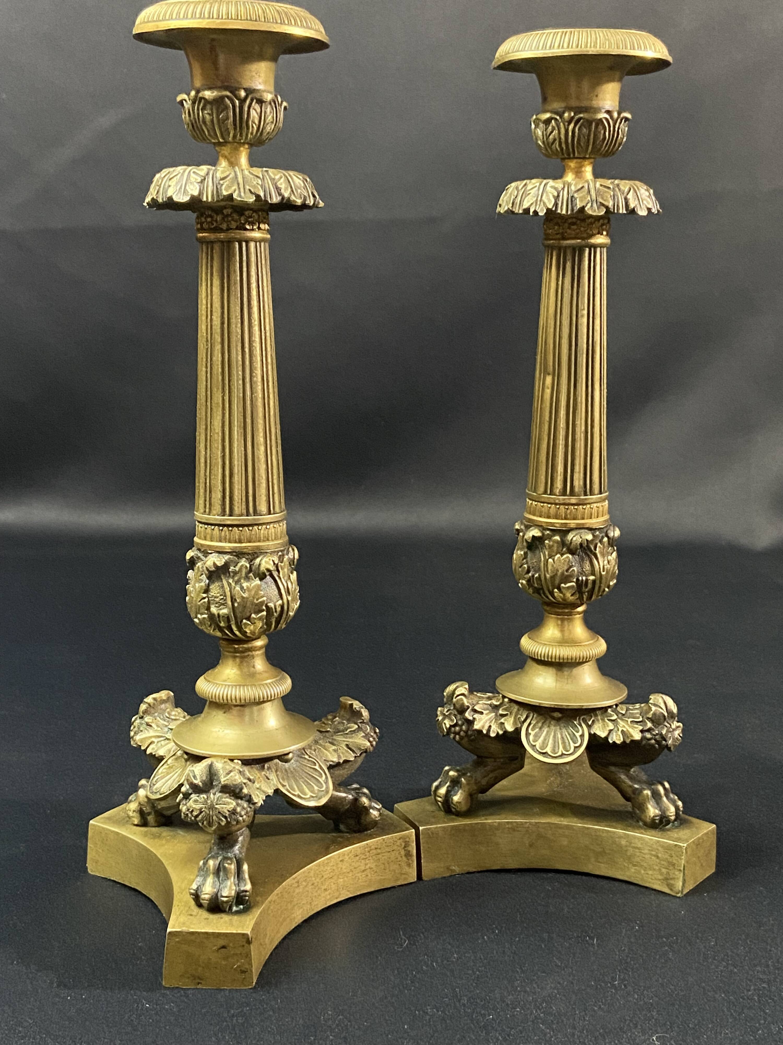 Pair of gilt and chiseled bronze candlesticks from the Restoration period