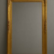 Empire period mirror in wood and gilded stucco circa 1810-1820