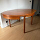 Extendable teak round table