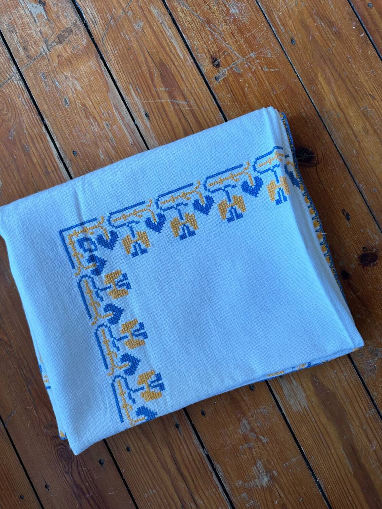 Embroidered white tablecloth