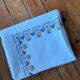 Embroidered white tablecloth