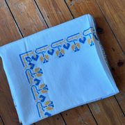 Embroidered white tablecloth