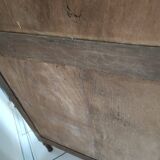 Bonnetière man standing cabinet a door