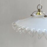 Notched opaline suspension