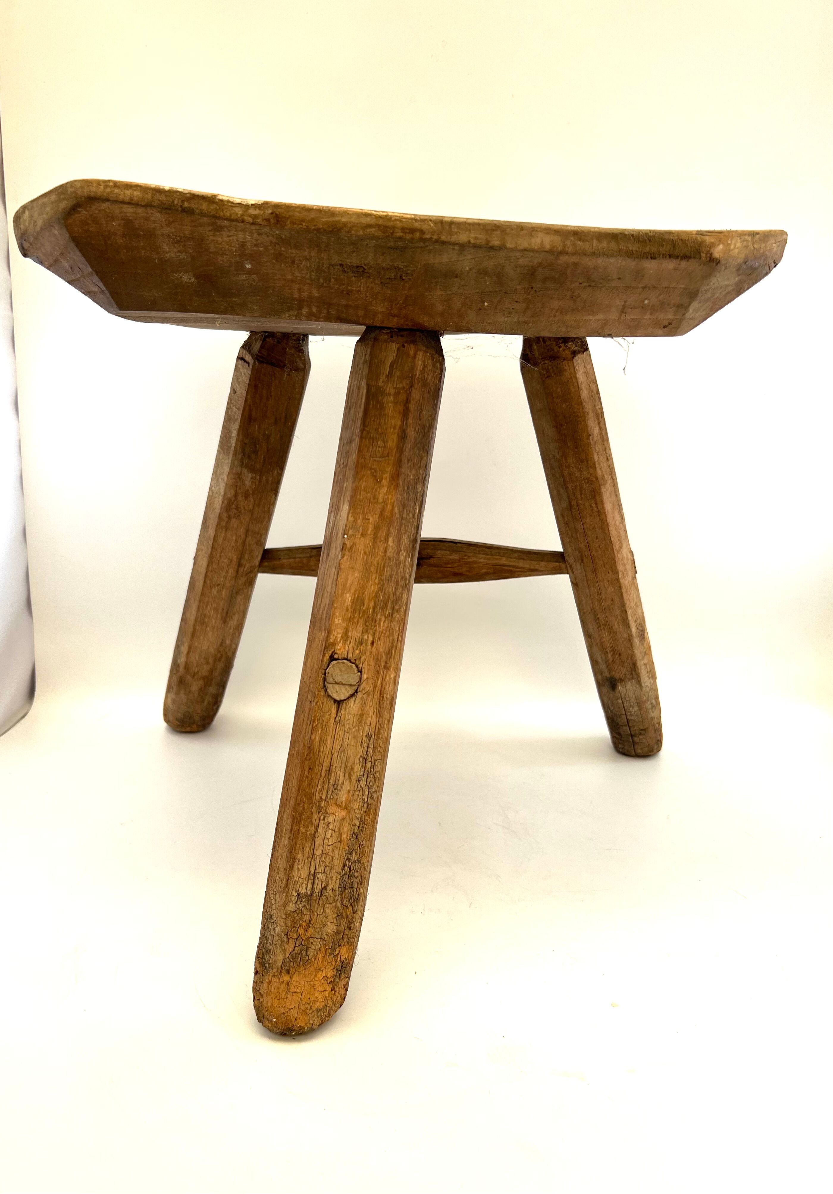 Rustic tripod wood stool