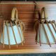 Pair of rattan wall lamps