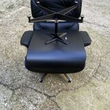Charles Eames all-black lounge chair and ottoman, Herman Miller edition