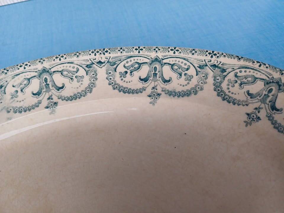Oval ironstone plate from around 1900.