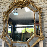Mirror with parecloses with pediment, gilded with gold leaf