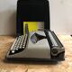 Old writing machine polyjo super 75 bakelite grey + vintage black trunk