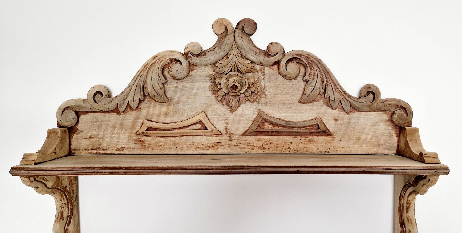 Old wall shelf carved in walnut