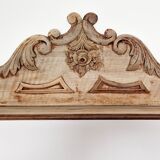 Old wall shelf carved in walnut