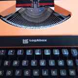 Machine à écrire orange vintage 1970