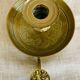 20th century chiseled brass socket candle holder representing Horsemen in armor