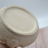Cache pot visage