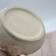 Cache pot visage