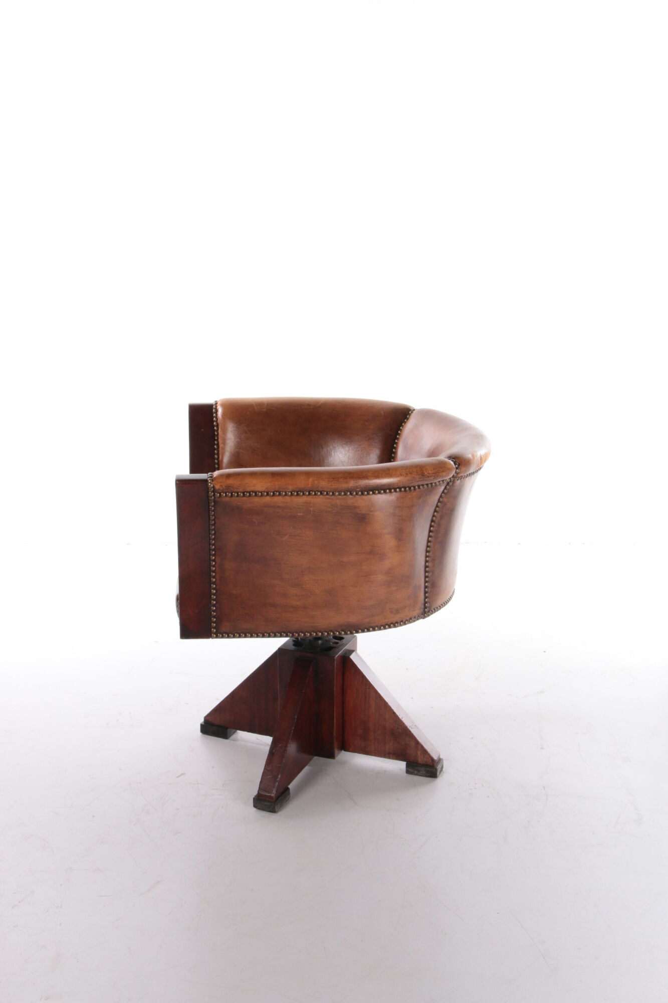 Sheepskin leather desk chair with wooden swivel base, 1970