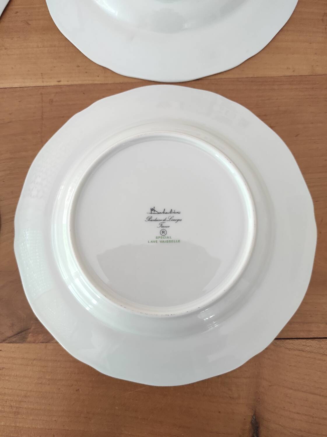 Set of 4 Limoges porcelain soup plates