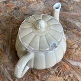 Beige earthenware teapot