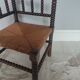 Turned wooden corner chair