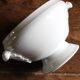 Antique soup tureen, white earthenware, with stopper decoration.