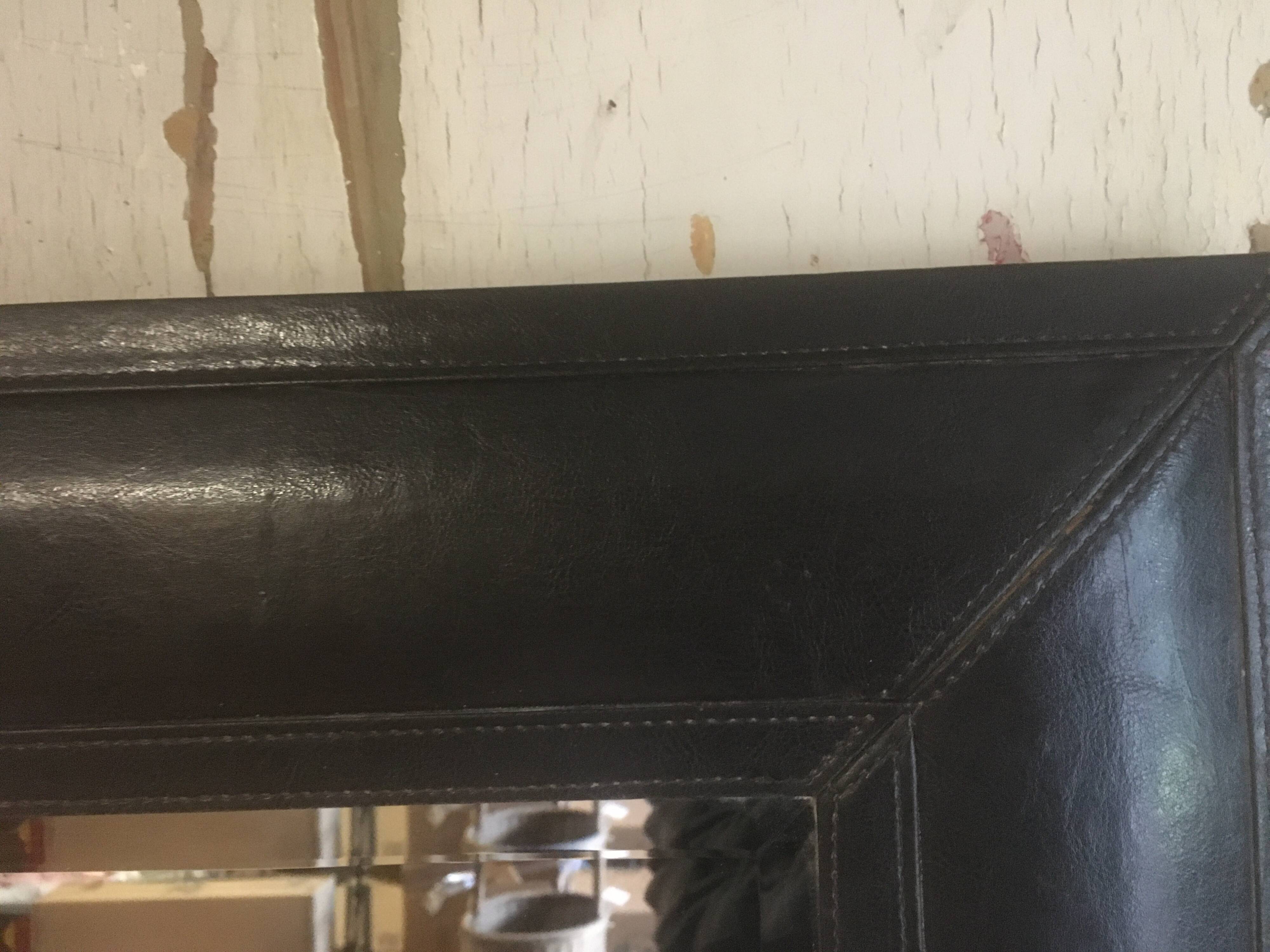 Beveled leather mirror 90x70