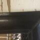 Beveled leather mirror 90x70
