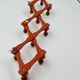 Vintage orange accordion coat rack