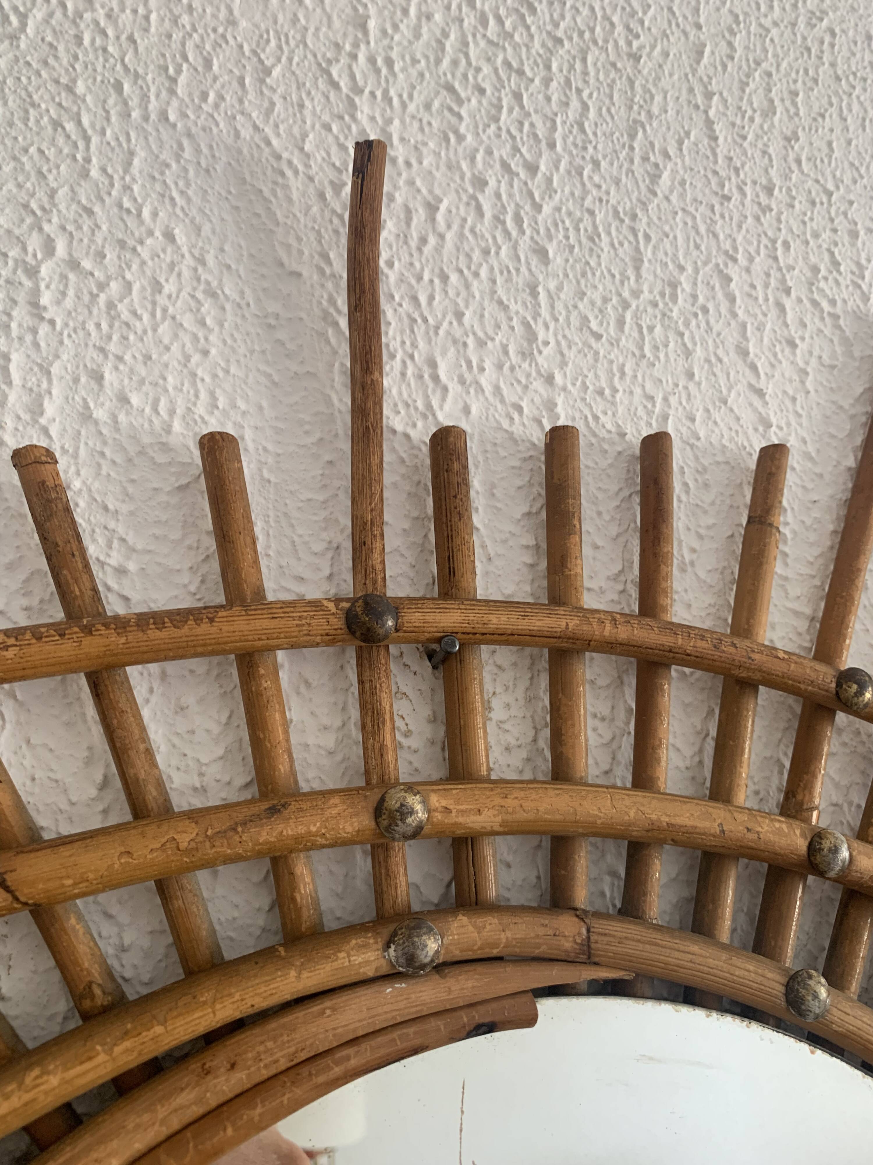 Vintage 1960s sunburst rattan ortf style spiral eye mirror - 90 x 67 cm